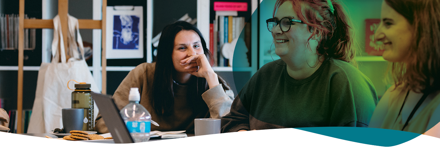 students in art room looking at screen
